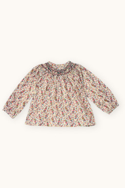 Margot smocked baby blouse in Liberty