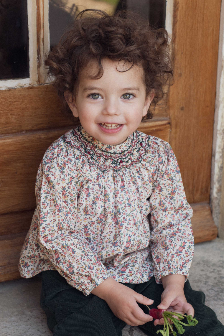 Margot smocked baby blouse in Liberty