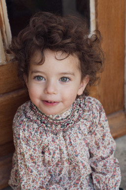 Margot smocked baby blouse in Liberty